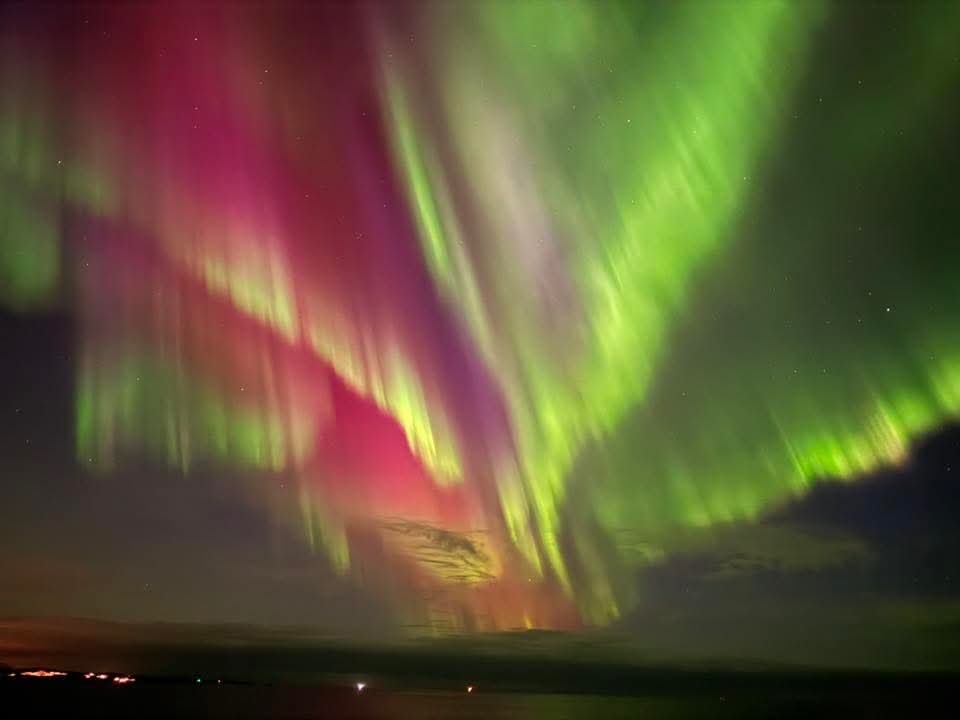 Green aurora on the horizon